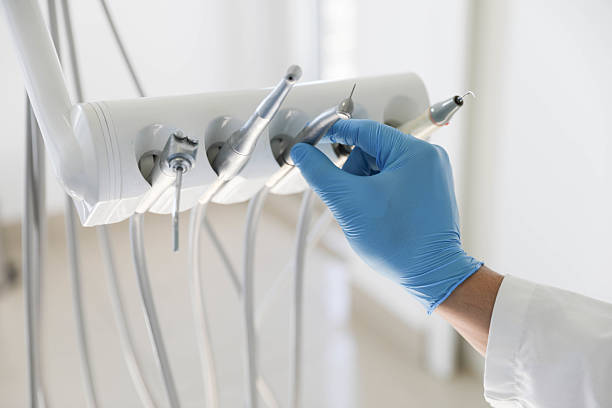Professional Dental Implants technician working in East End, AR